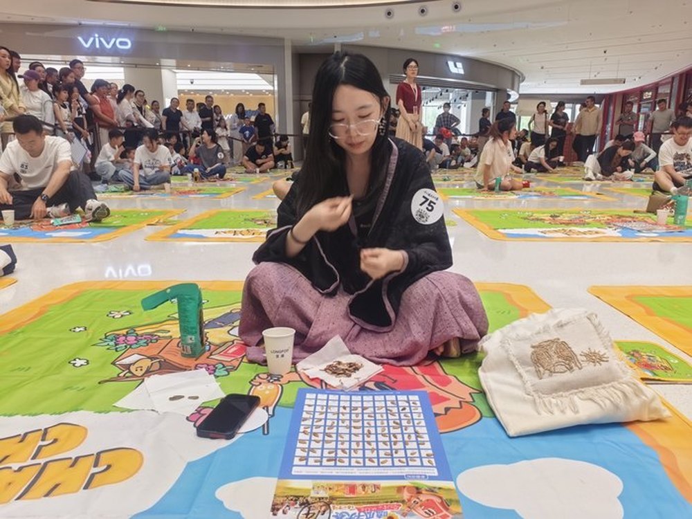 “0531济南节”济南一商场举办嗑瓜子大赛 - 图1