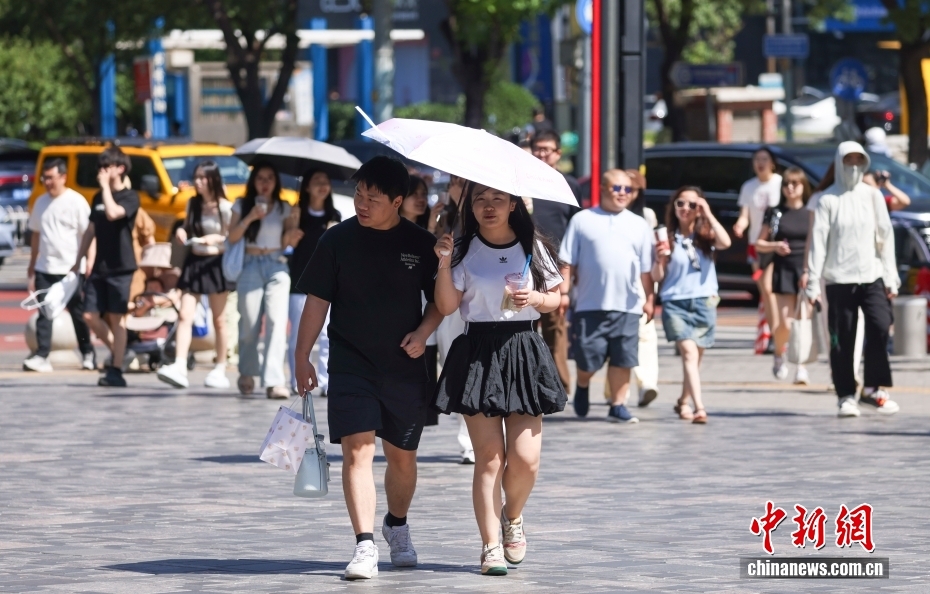 北京迎来今年首个高温日 较常年提前11天 - 图1